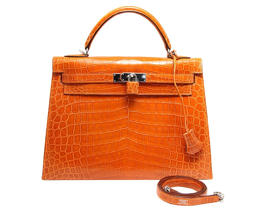Фото сумки Гермес Kelly оранжевой из кожи крокодила.